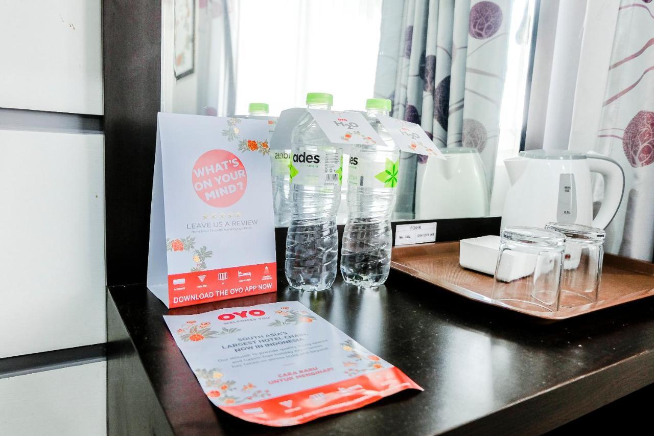 Oyo 803 Toetie Hotel Бату Екстериор снимка